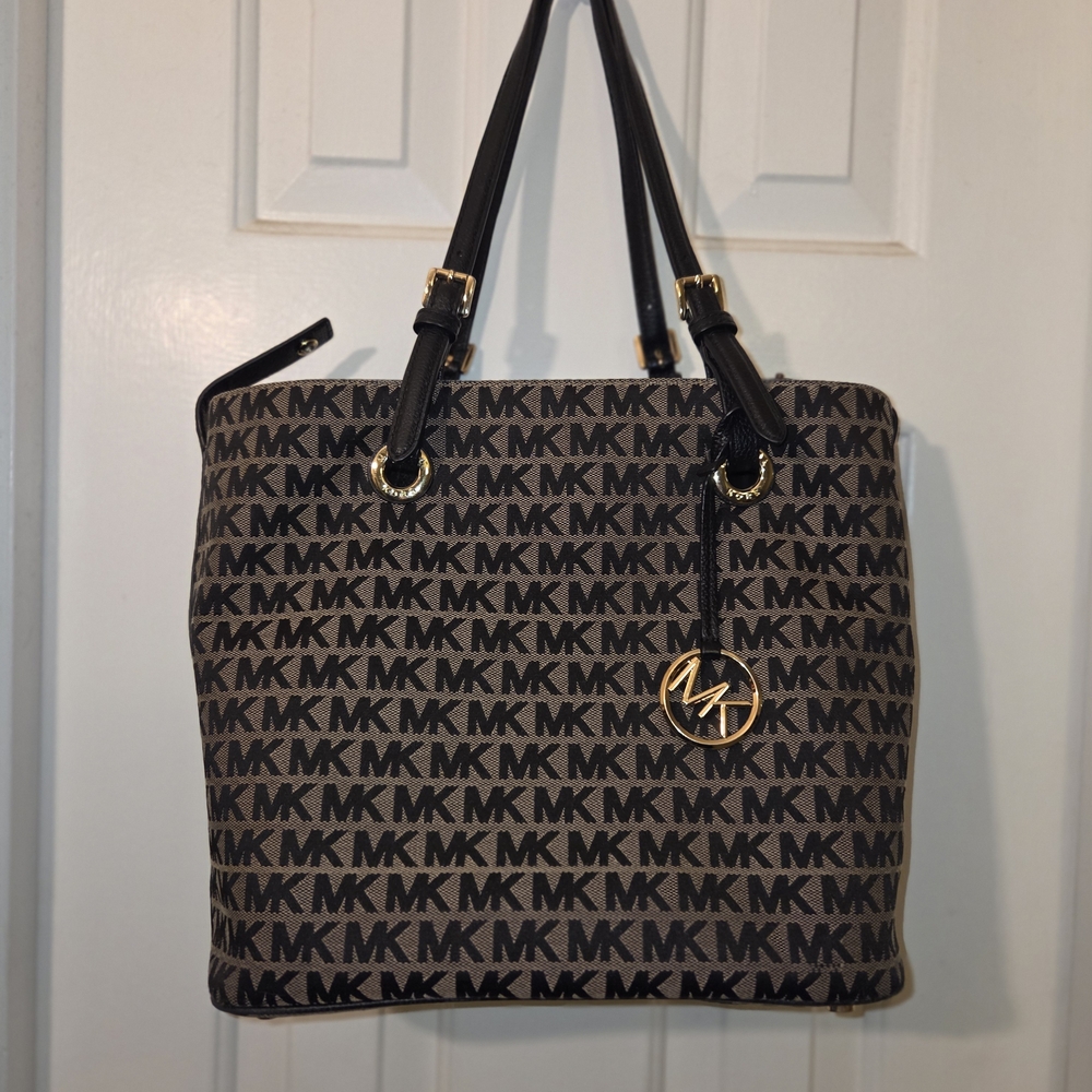 Michael Kors: Gently Used Condition Signature Black and Tan Tote.